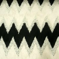 40644-Strickstoff-Fellstoff-Zacken-schwarz-creme-_1.jpg Strickstoff Fellstoff Zacken schwarz creme 1.45m Breite