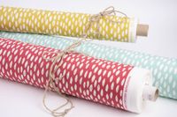 Dekostoff Bayside Honeydew rot mit Klecksen Tropfen 1.38m Breite