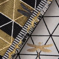 56640-Dekostoff-Jacquard-Stoff-Dreiecke-weiss-sch_3.jpg Dekostoff Jacquard-Stoff Dreiecke weiß schwarz Libelle gold 1.40m
