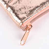 59059-Kosmetiktasche-Magic-Bag-rose-goldfarbig-glaenzend-20x11-5x9cm-KW19-67840Capture0024.jpg Mäppchen mit Rautensteppung rose-goldfarbig glänzend 21x14.5cm