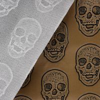 Kunstleder Lederimitat Relief Totenkopf metallic gold schwarz 1.4m