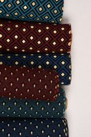 Dekostoff Jacquard-Stoff Art Deco Rauten Retro rot schwarz gold 140cm