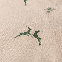SCHÖNER LEBEN. Tischdecke Hirsch Edelweiß natur grün Detail Motiv