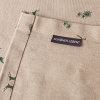 SCHÖNER LEBEN. Tischdecke Hirsch Edelweiß natur grün Detail Saum und Label