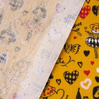 Baumwollstoff Popeline ARLEQUEEN Tänzerin Herzen ockergelb bunt 1.50m