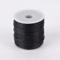 66387-Baumwollband-gewachst-1mm-schwarz-100m-KW15-106126Capture0156.jpg Creativ Company Baumwollband gewachst 1mm schwarz 100m