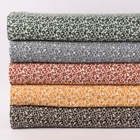 Double Gauze Musselin glatt Leopardenmuster weiß beige ocker 1.35m