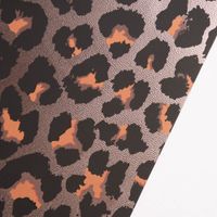 Platzset Leomuster Kunststoff kupferfarbig schwarz orange 45x30cm