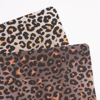 Platzset Leomuster Kunststoff kupferfarbig schwarz orange 45x30cm