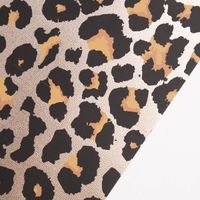 Platzset Leomuster Kunststoff goldfarbig schwarz gelb 45x30cm