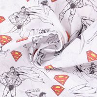 Baumwollstoff Popeline Digitaldr. Superman™© weiß schwarz rot gelb 1.5