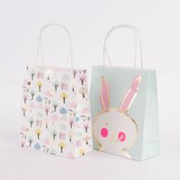 Rico Design Geschenktüte mittel Wonderland Hase Einhorn pastell bunt 2 Stück 18x21x8cm
