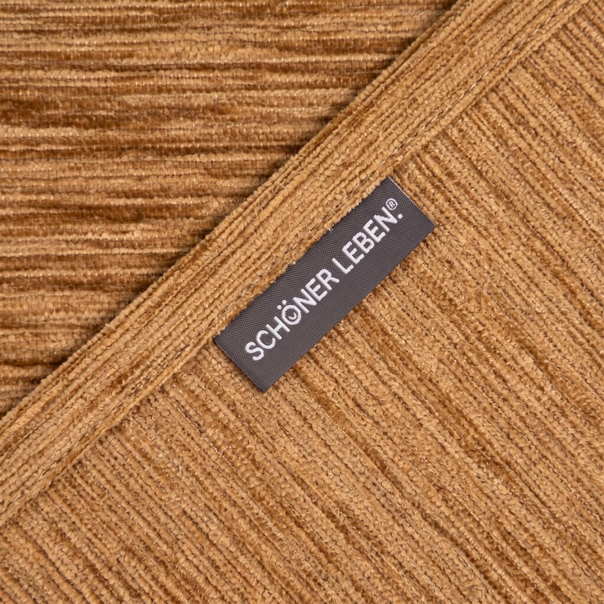 SCHÖNER LEBEN. Thermovorhang Thermochenille Akustik Kälteschutz goldbraun 245cm oder Wunschlänge Chenille-Stoff in Goldbraun aus der Nähe, sichtbares Strukturmuster und angenähtes SCHÖNER LEBEN Label