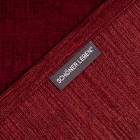 Detailansicht vom roten Chenille-Material mit sichtbarem SCHÖNER LEBEN Etikett