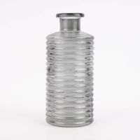 82210-Vase-zylinderfoermig-mit-Rillenpraegung-u--schmalem-Hals-Glas-klar-grau-9-5x21-5cm-KW44-2022-205418Capture0006.jpg Vase zylinderförmig mit Rillenprägung u. schmalem Hals Glas klar grau 9.5x21.5cm