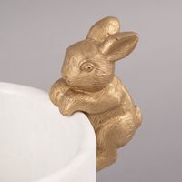 83117-uebertopf-mit-Hase-Zement-weiss-goldfarbig-14x19cm---KW6-2023-210562Capture0020.jpg Übertopf mit Hase Zement weiß goldfarbig 14x19cm