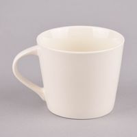 Grafik Werkstatt Goldtasse Frohe Ostern Blumenkranz weiß pastell goldfarbig 420ml