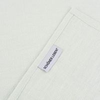Detailansicht des mintgrünen Geschirrtuchs mit SCHÖNER LEBEN. Label – hochwertige Kantenverarbeitung