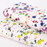 Baumwolljerseystoff Splatter Farbkleckse weiß neongrün bunt 1.45m