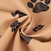 Outdoorstoff polsterfähig Pawprints Hundepfoten beige schwarz 1.60m br