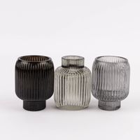 85637-Kerzenhalter-fuer-Stabkerzen-und-Teelichter-Glas-Rillen-6-5x8-5cm-verschiedene-Farben-KW35-2023-228650Capture0005.jpg Gruppenbild Kerzenhalter mit 2 Funktionen: Teelichthalter und Stabkerzenhalter