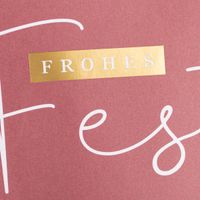 geschenktüte frohes fest schleife rot detailaufnahme