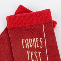 Nahaufnahme Bund Weihnachtssocke Frohes Fest Stern in Umverpackung