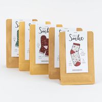 Weihnachtssocken mit verschiedenen Motiven in Umverpackung
