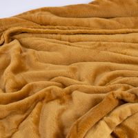 kuscheldecke camelbraun in wellen ausgebreitet