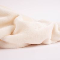 kuscheldecke cremeweiß Detailaufnahme Material