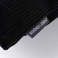 Kissenhülle Breitcord schwarz detail markentag