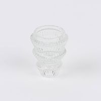 Transparenter Kerzenhalter aus Glas als Teelichthalter