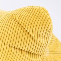 86386-Magma-Leseknochen-Nackenkissen-Cord-gelb-42x22cm-86386-02.jpg Magma Leseknochen Nackenkissen Cord gelb Detailaufnahme