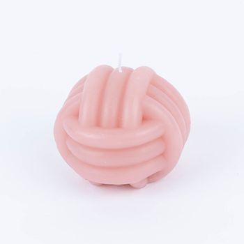 kerze in Knotenform 3 stück in hellgrün, rosa und dunklerem grün nebeneinander