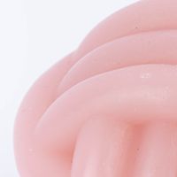 detailaufnahme seite rosa kerze in knotenform 86401-Kerze-Knoten-pastellfarben-rosa-hellgruen-oder-dunkelgruen-8x7-5cm-112381-04.jpg