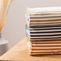Kuschelweicher French Terry mit Streifen in Creme und Rostbraun Gruppenbild