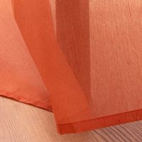 Halbtransparenter Ösenvorhang mit tollem Batik Farbverlauf in Orange