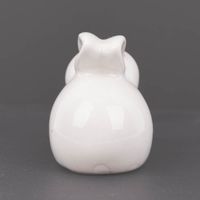 87110-Dekofigur-Hase-hockend-aus-Porzellan-weiss-6x4x5cm-von-Rico-Design-87110-03.jpg Dekofigur hase aus porzellan weiß rückansicht