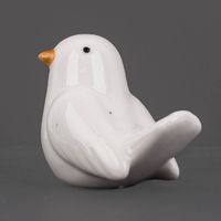 87111-Dekofigur-Vogel-aus-Porzellan-weiss-7x4-5x5cm-von-Rico-Design-87111-03.jpg Dekofigur Vogel aus Porzellan weiß ansicht schräg von hinten