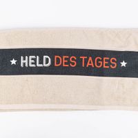 Handtuch held des tages beige detail banderole