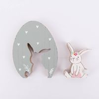 Deko Ei mit Hasen cutout in mint mit weißen herzen