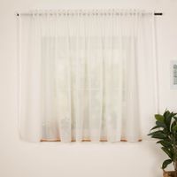 89264-Gardine-mit-Smok-Schlaufenband-uni-Wollweiss-transparent-Leinenstruktur-in-verschiedenen-Groessen-IMG-2443.jpg Zeitlose Gardine in Wollweiß mit natürlicher Leinenstruktur und praktischem Smok-Schlaufenband. Der transparente Stoff sorgt für eine helle Atmosphäre und dezenten Sichtschutz – in verschiedenen Größen erhältlich - zugezogen am Fenster