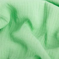 Musselin Stoff Double Gauze einfarbig lime grün 1,35m Breite in Falten