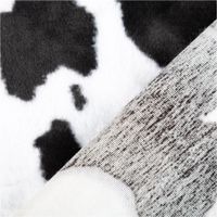 Kuschelweiches Plüsch Stoff Fellimitat im Kuhfell-Look in Schwarz und Weiß mit 1,60m Stoffbreite mit Rueckseite
