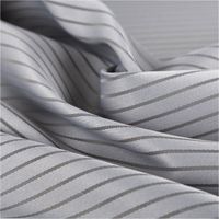 Moderne Schiebegardinen Meterware Clio mit Streifen in Grau 60cm Breite drapiert