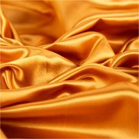 90375-Satinstoff-uni-goldfarbig-1-46cm-Breite--MG-2633.jpg Satinstoff Uni Goldfarbig – Glänzender Stoff für Mode, Kostüme & Deko drapiert
