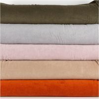 Frottee Stoff Stretch grau – Weich, Saugfähig & Perfekt für Bekleidung & Heimtextilien mit anderen Stoffen in Szene gesetzt