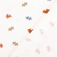 Jersey Stoff Baumwolljersey mit kleinen Puzzleteilen – Weich, elastisch & hautfreundlich in Wollweiß (/1,50 m Breite) mit Rueckseite