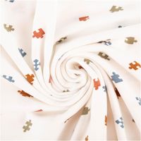91136-Jersey-Stoff-Baumwolljersey-Puzzle-wollweiss-bunt-1-50m-Breite--MG-5893.jpg Jersey Stoff Baumwolljersey mit kleinen Puzzleteilen – Weich, elastisch & hautfreundlich in Wollweiß (/1,50 m Breite) kunstvoll eingedreht in Falten