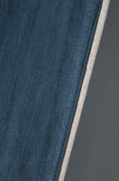 Detailaufnahme von seitlicher Einfassung in Beige